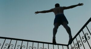 aftersun cinematography by gregory oke exterior day wide shot establishing shot hard light sunlight shot 010