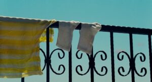 aftersun cinematography by gregory oke exterior day wide shot establishing shot hard light sunlight shot 043