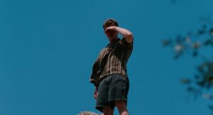 aftersun cinematography by gregory oke exterior day wide shot establishing shot soft light sunlight shot 027