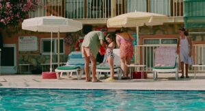 aftersun cinematography by gregory oke exterior day wide shot three shot hard light sunlight shot 055