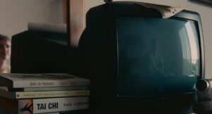 aftersun cinematography by gregory oke interior day medium shot hard light practical light shot 004