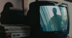 aftersun cinematography by gregory oke interior day medium shot hard light practical light shot 023