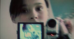 aftersun cinematography by gregory oke interior day wide shot establishing shot hard light daylight shot 025