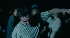 aftersun cinematography by gregory oke interior night medium close up silhouette artificial light shot 036