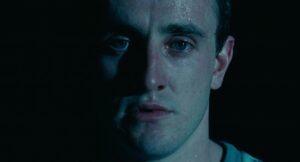 aftersun cinematography by gregory oke interior night medium close up soft light artificial light shot 017