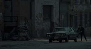 american gangster cinematography by harris savides exterior night medium wide shot artificial light car shot 033
