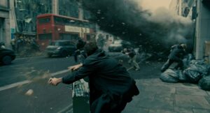 children of men cinematography by emmanuel lubezki day medium close up three shot backlight bus shot 008