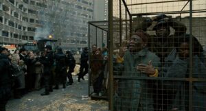 children of men cinematography by emmanuel lubezki day wide shot three shot backlight shot 058