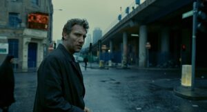 children of men cinematography by emmanuel lubezki exterior day medium close up three shot shot 002