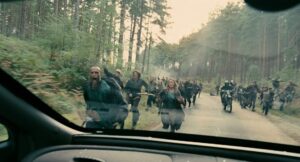 children of men cinematography by emmanuel lubezki exterior day medium wide shot backlight daylight shot 070