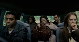 children of men cinematography by emmanuel lubezki night medium close up three shot silhouette artificial light shot 035