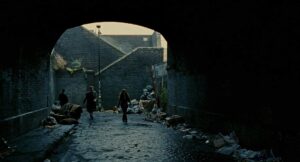 children of men cinematography by emmanuel lubezki night three shot silhouette artificial light shot 016