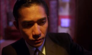 in the mood for love cinematography by christopher doyle extreme close up silhouette artificial light shot 060