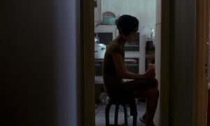 in the mood for love cinematography by christopher doyle interior night medium close up silhouette artificial light shot 005