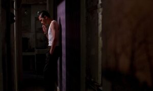 in the mood for love cinematography by christopher doyle interior night medium shot artificial light shot 045