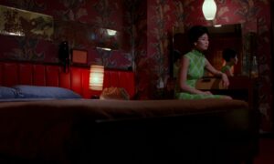 in the mood for love cinematography by christopher doyle interior night medium wide shot over the shoulder artificial light shot 007
