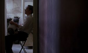 in the mood for love cinematography by christopher doyle medium close up silhouette artificial light shot 006