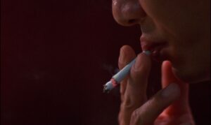 in the mood for love cinematography by christopher doyle night extreme close up artificial light shot 028