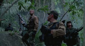 predator cinematography by donald mcalpine day medium close up three shot shot 012