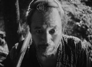 rashomon cinematography by kazuo miyagawa day extreme close up side lighting shot 038
