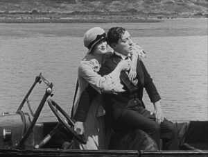 sherlock jr cinematography by elgin lessley day medium close up two shot backlight sunlight shot 068