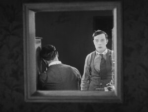 sherlock jr cinematography by elgin lessley medium shot two shot sunlight shot 015