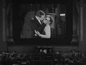 sherlock jr cinematography by elgin lessley night medium shot three shot artificial light shot 062