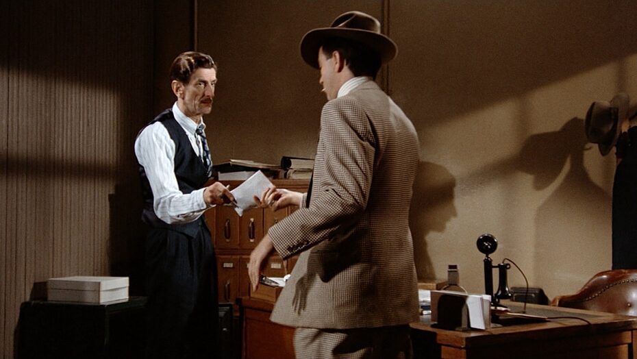 GENRE: Comedy, Crime, Gangster, Heist, Drama, Gambling DIRECTOR: George Roy Hill CINEMATOGRAPHER: Robert Surtees PRODUCTION DESIGNER: Henry Bumstead COSTUME DESIGNER: Edith Head EDITOR: William Reynolds ACTORS: James Sloyan, Ed Bakey SHOT TIME: 00:03:58 TIME PERIOD: 1930s ASPECT RATIO: 1.85 - Spherical FORMAT: Film - 35mm FRAME SIZE: Medium Wide SHOT TYPE: 2 shot, Low angle LENS SIZE: Wide COMPOSITION: Center LIGHTING: Hard light LIGHTING TYPE: Daylight TIME OF DAY: Day INTERIOR/EXTERIOR: Interior SET: Office STORY LOCATION: ... Illinois > Joliet FILMING LOCATION: ... North America > USA CAMERA: Mitchell BNCR LENS: Bausch and Lomb - Super Baltar