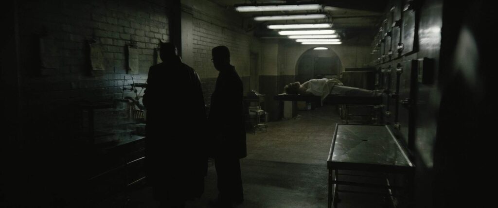 the batman cinematography by greig fraser interior night medium shot two shot artificial light shot 069