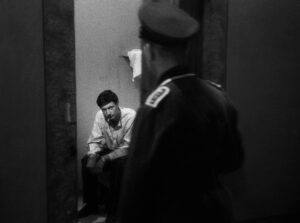 a man escaped cinematography by l once henri burel close up over the shoulder silhouette artificial light shot 063