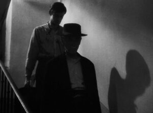 a man escaped cinematography by l once henri burel day close up two shot shot 023