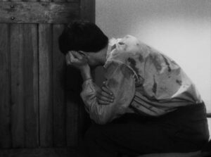 a man escaped cinematography by l once henri burel day extreme close up side lighting shot 064