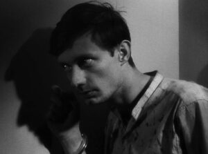 a man escaped cinematography by l once henri burel day extreme close up side lighting shot 070