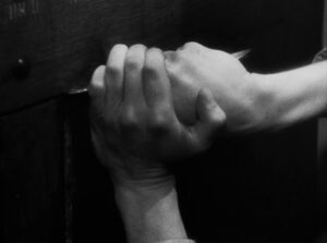 a man escaped cinematography by l once henri burel extreme close up silhouette artificial light shot 028