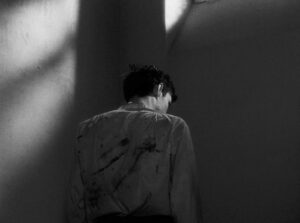 a man escaped cinematography by l once henri burel interior day close up backlight shot 006