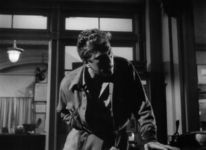 ace in the hole cinematography by charles lang day extreme close up side lighting shot 043