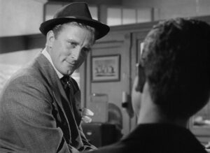 ace in the hole cinematography by charles lang day extreme close up two shot side lighting shot 027