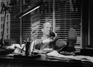 ace in the hole cinematography by charles lang day medium close up hard light shot 034