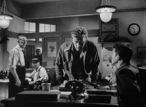 ace in the hole cinematography by charles lang day medium shot three shot hard light shot 013