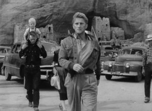 ace in the hole cinematography by charles lang exterior day medium close up three shot backlight daylight car shot 050