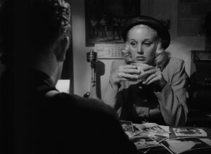 ace in the hole cinematography by charles lang extreme close up over the shoulder silhouette artificial light shot 039