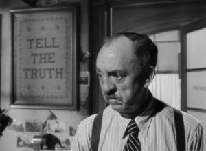 ace in the hole cinematography by charles lang interior day extreme close up hard light fluorescent shot 062