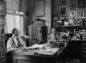 ace in the hole cinematography by charles lang interior day medium wide shot two shot side lighting fluorescent shot 030