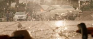 crash cinematography by j michael muro exterior day two shot backlight sunny car shot 012