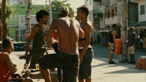 elite squad 2 the enemy within cinematography by lula carvalho day medium close up three shot backlight shot 047