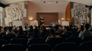 elite squad 2 the enemy within cinematography by lula carvalho interior day medium wide shot over the shoulder backlight shot 025