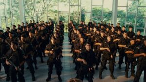 elite squad 2 the enemy within cinematography by lula carvalho interior day medium wide shot three shot backlight fluorescent shot 069