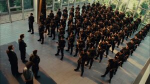 elite squad 2 the enemy within cinematography by lula carvalho interior day medium wide shot three shot backlight shot 057