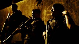 elite squad 2 the enemy within cinematography by lula carvalho night close up three shot silhouette artificial light shot 064