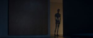 ex machina cinematography by rob hardy interior night medium wide shot artificial light shot 067